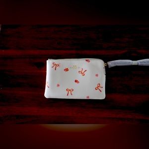 Coach Corner Zip Wristlet with Bow Print